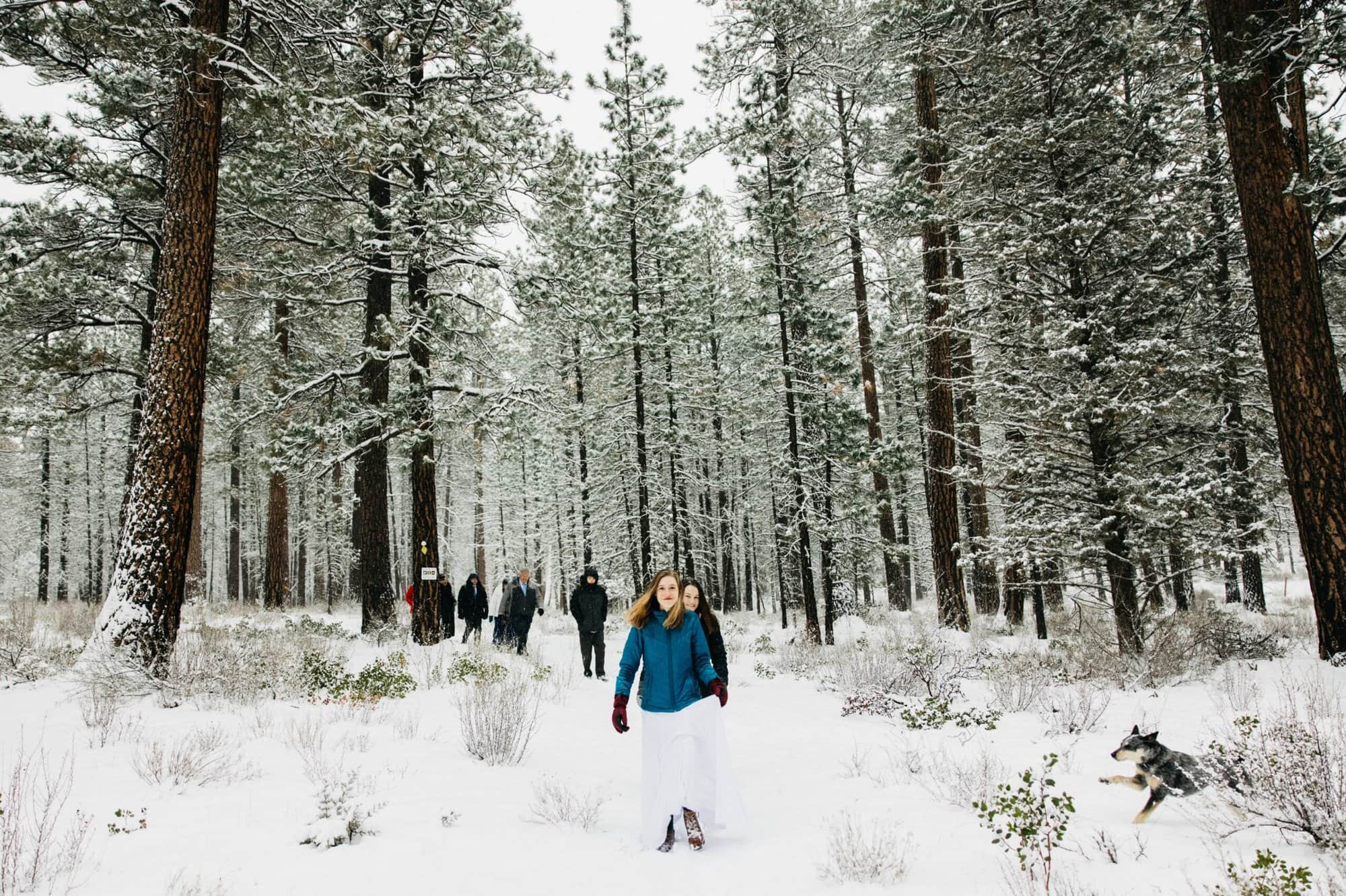 Rides hiking in the snow winter wedding in Oregon